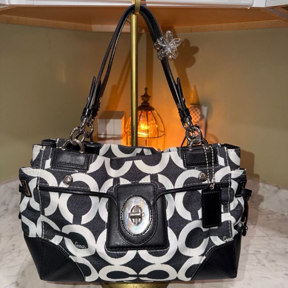like new Coach peyton op art carryall handbag